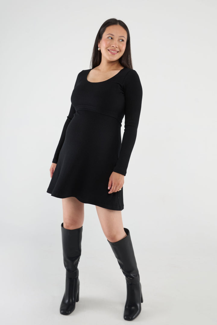 Above-the-knee maternity nursing dress with a fitted top, A-line skirt, and easy lift-up nursing access. Stylish, comfortable, and made in Canada.