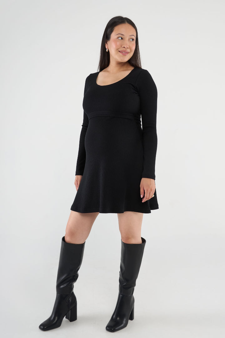 Above-the-knee maternity nursing dress with a fitted top, A-line skirt, and easy lift-up nursing access. Stylish, comfortable, and made in Canada.