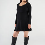 Above-the-knee maternity nursing dress with a fitted top, A-line skirt, and easy lift-up nursing access. Stylish, comfortable, and made in Canada.