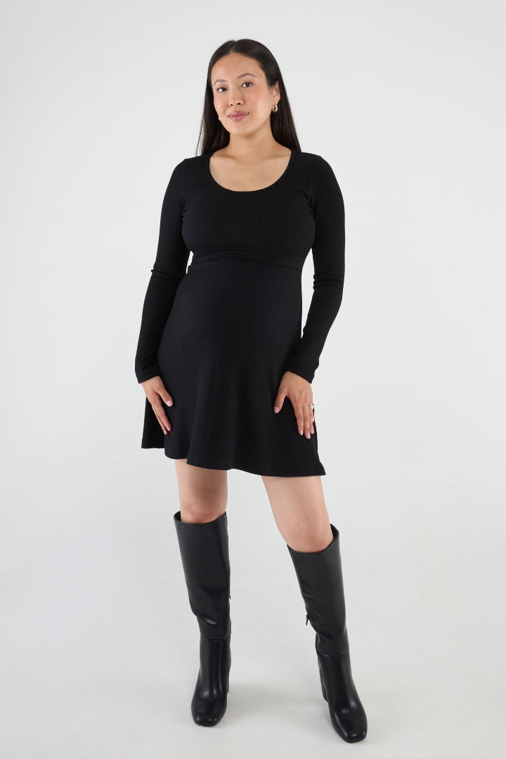 Above-the-knee maternity nursing dress with a fitted top, A-line skirt, and easy lift-up nursing access. Stylish, comfortable, and made in Canada.