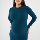 Embrace your curves with the Scarlett Rib Maxi Dress. Crafted from our ultra-soft baby rib fabric, this dress provides impressive stretch and retention. The bodycon fit gracefully hugs your bump, and the side slit allows for easy movement.