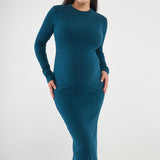 Embrace your curves with the Scarlett Rib Maxi Dress. Crafted from our ultra-soft baby rib fabric, this dress provides impressive stretch and retention. The bodycon fit gracefully hugs your bump, and the side slit allows for easy movement.