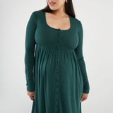 The Cadence Nursing Dress offers effortless style and all-day comfort in ultra-soft modal rib. Long sleeves and a full-length silhouette make it ideal year-round, while the functional button front allows for easy nursing and customizable leg coverage