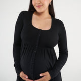 The Cadence Nursing Dress offers effortless style and all-day comfort in ultra-soft modal rib. Long sleeves and a full-length silhouette make it ideal year-round, while the functional button front allows for easy nursing and customizable leg coverage.