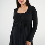 The Cadence Nursing Dress offers effortless style and all-day comfort in ultra-soft modal rib. Long sleeves and a full-length silhouette make it ideal year-round, while the functional button front allows for easy nursing and customizable leg coverage.