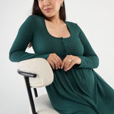 The Cadence Nursing Dress offers effortless style and all-day comfort in ultra-soft modal rib. Long sleeves and a full-length silhouette make it ideal year-round, while the functional button front allows for easy nursing and customizable leg coverage