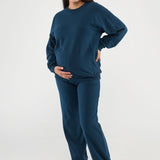 Made from our Cozy Fleece, an ultra-soft bamboo-cotton blend with a brushed interior, this pullover delivers warmth without bulk. Ribbed side panels provide extra stretch and ease, adapting comfortably through all stages of pregnancy and postpartum.