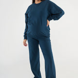 Made from our Cozy Fleece, an ultra-soft bamboo-cotton blend with a brushed interior, this pullover delivers warmth without bulk. Ribbed side panels provide extra stretch and ease, adapting comfortably through all stages of pregnancy and postpartum.