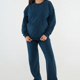 Made from our Cozy Fleece, an ultra-soft bamboo-cotton blend with a brushed interior, this pullover delivers warmth without bulk. Ribbed side panels provide extra stretch and ease, adapting comfortably through all stages of pregnancy and postpartum.