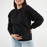 Made from our Cozy Fleece, an ultra-soft bamboo-cotton blend with a brushed interior, this pullover delivers warmth without bulk. Ribbed side panels provide extra stretch and ease, adapting comfortably through all stages of pregnancy and postpartum.