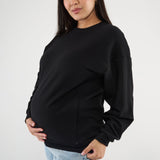 Made from our Cozy Fleece, an ultra-soft bamboo-cotton blend with a brushed interior, this pullover delivers warmth without bulk. Ribbed side panels provide extra stretch and ease, adapting comfortably through all stages of pregnancy and postpartum.