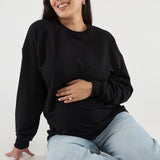 Made from our Cozy Fleece, an ultra-soft bamboo-cotton blend with a brushed interior, this pullover delivers warmth without bulk. Ribbed side panels provide extra stretch and ease, adapting comfortably through all stages of pregnancy and postpartum.