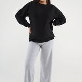 Made from our Cozy Fleece, an ultra-soft bamboo-cotton blend with a brushed interior, this pullover delivers warmth without bulk. Ribbed side panels provide extra stretch and ease, adapting comfortably through all stages of pregnancy and postpartum.
