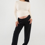 Made from soft, breathable Lyocell fabric, the Everyday Sweatpant sits comfortably below the bump with an elastic waist and ankle cuffs for a secure fit without pressure. The relaxed leg and single back pocket add casual style, while the low-rise design sits comfortably under growing bellies for all-day ease.