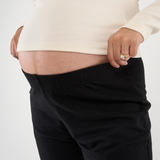 Made from soft, breathable Lyocell fabric, the Everyday Sweatpant sits comfortably below the bump with an elastic waist and ankle cuffs for a secure fit without pressure. The relaxed leg and single back pocket add casual style, while the low-rise design sits comfortably under growing bellies for all-day ease.