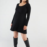 Above-the-knee maternity nursing dress with a fitted top, A-line skirt, and easy lift-up nursing access. Stylish, comfortable, and made in Canada.